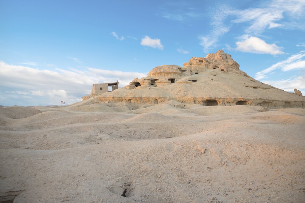 Learn about the ancient tombs of the "Mountain of the Dead" in Siwa