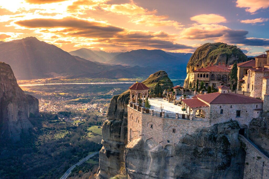Savor the sunset views over the majestic Meteora pillars