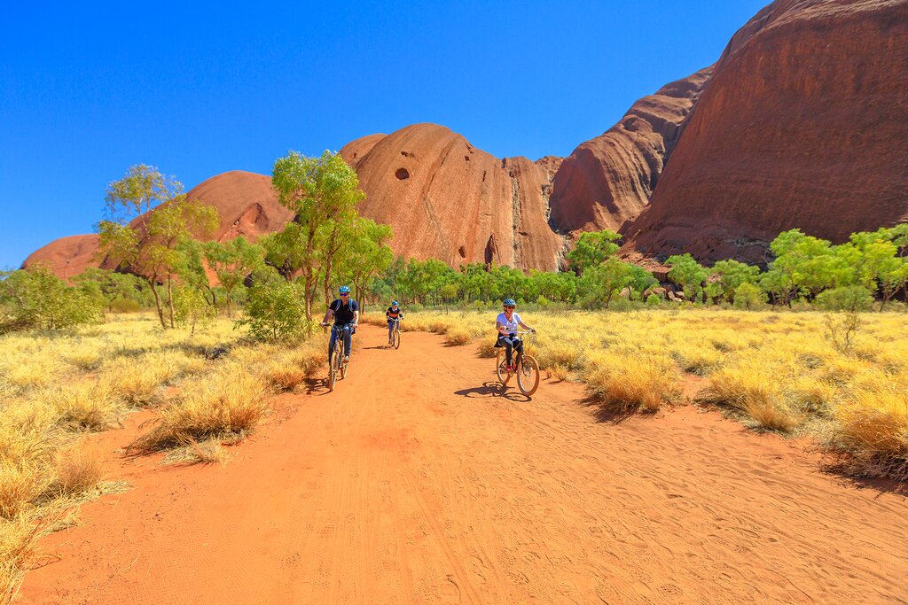 Family cycle around Uluru