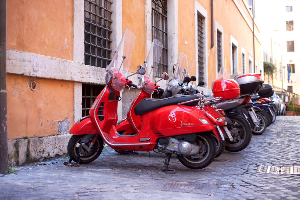 Rent a Vespa to explore the Tuscan hills