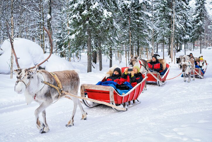 It doesn't get more Christmassy than riding a sled led by reindeer