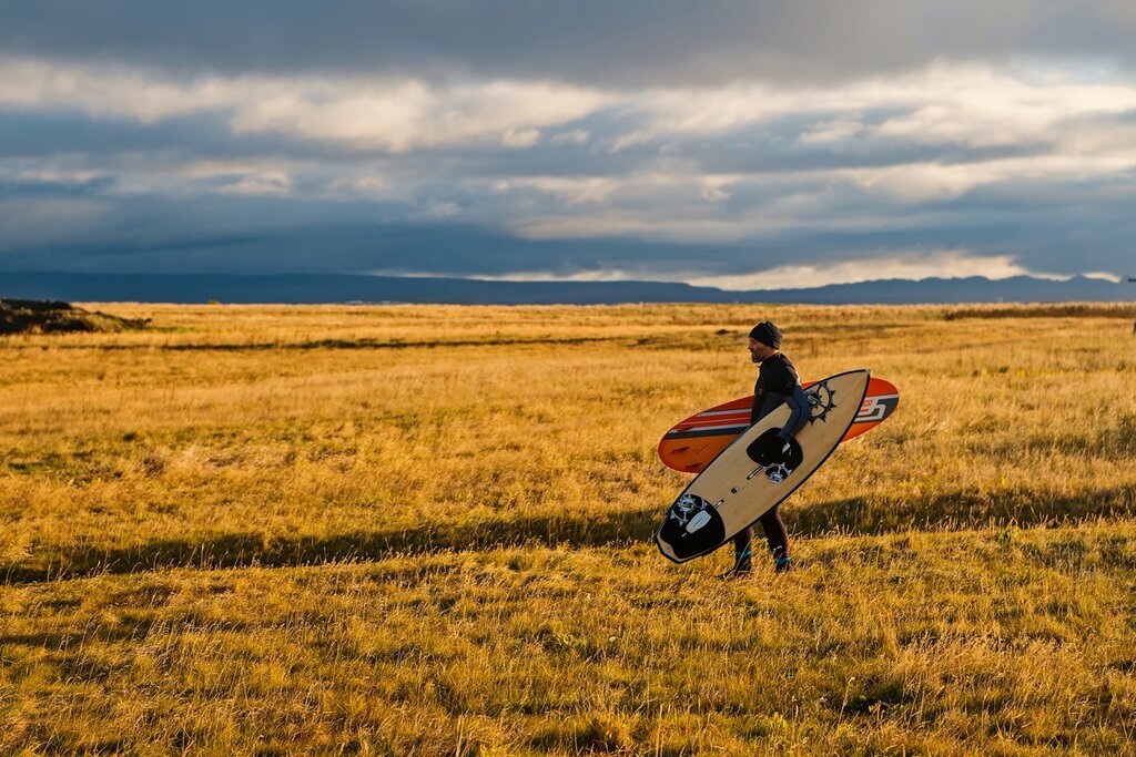 Experience outdoor adventures like surfing and ziplining on this luxury adventure through Iceland