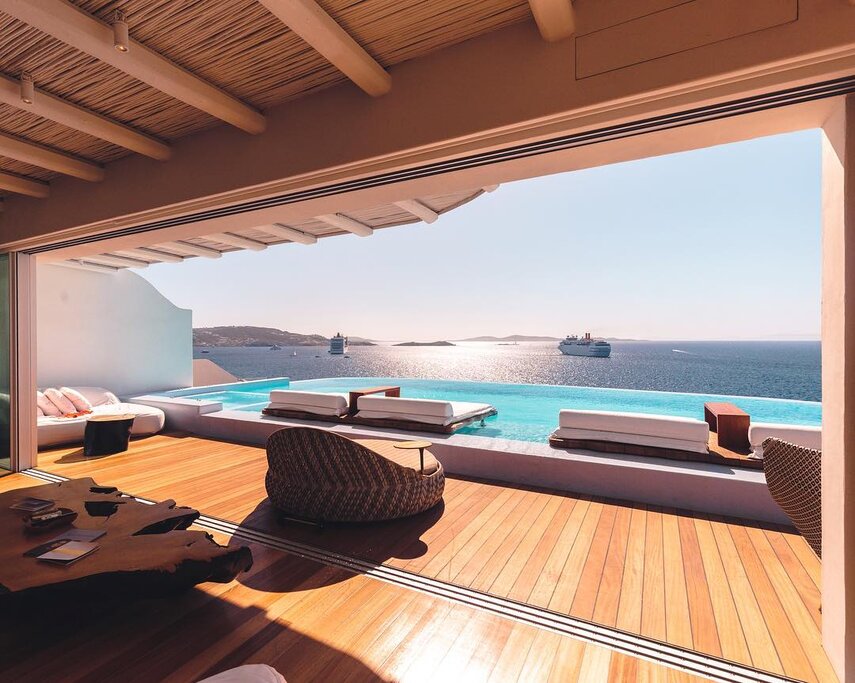 Stay two nights in a cliffside hotel in Mykonos (photo courtesy of Cavo Tagoo Mykonos)