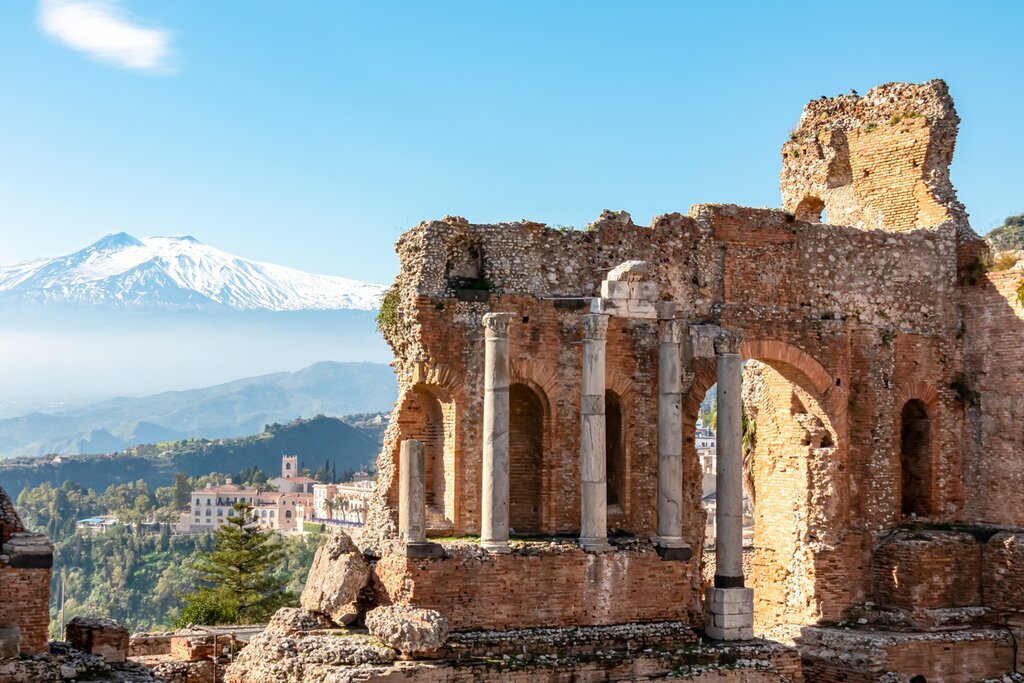 Taormina's Teatro Greco with a snowcapped Mount Etna