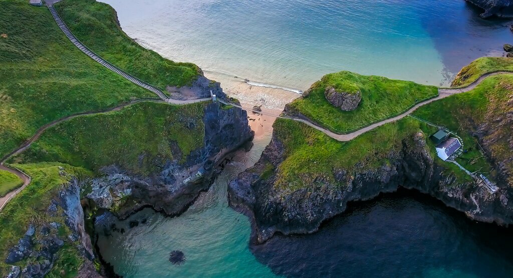 Walk across the Carrick-a-Rede Rope Bridge while exploring the Antrim Coast