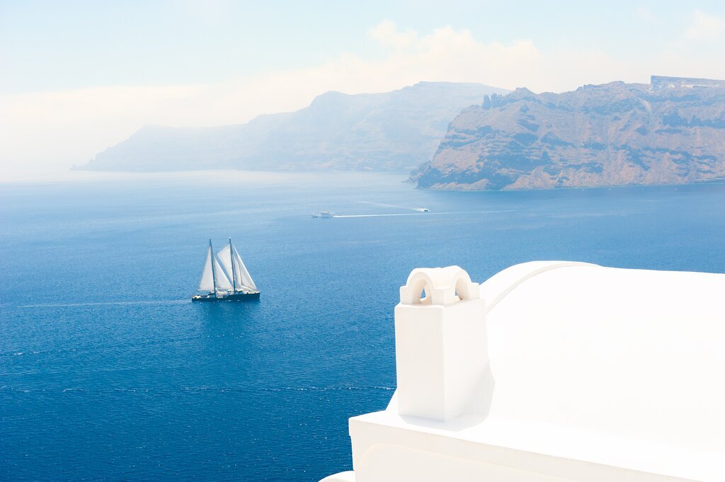 Your luxury sailing adventure sets off from Santorini