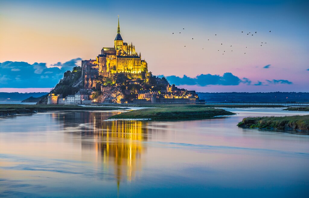 The enchanting Mont-Saint-Michel seems to rise out of its tidal estuary