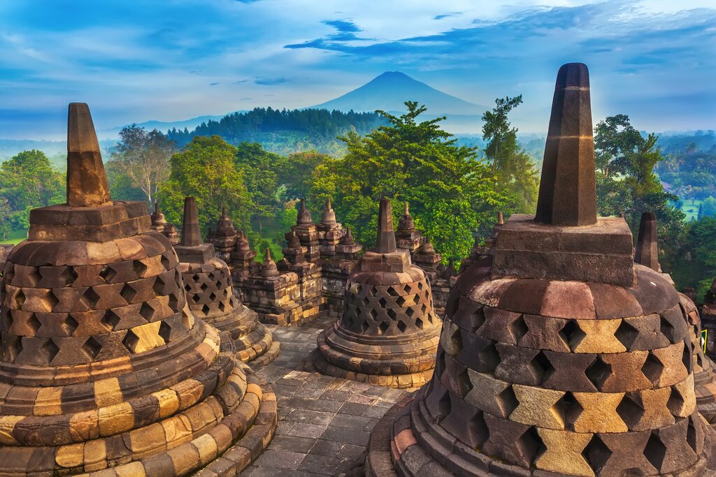 Wander around the iconic stupas at Borobudur