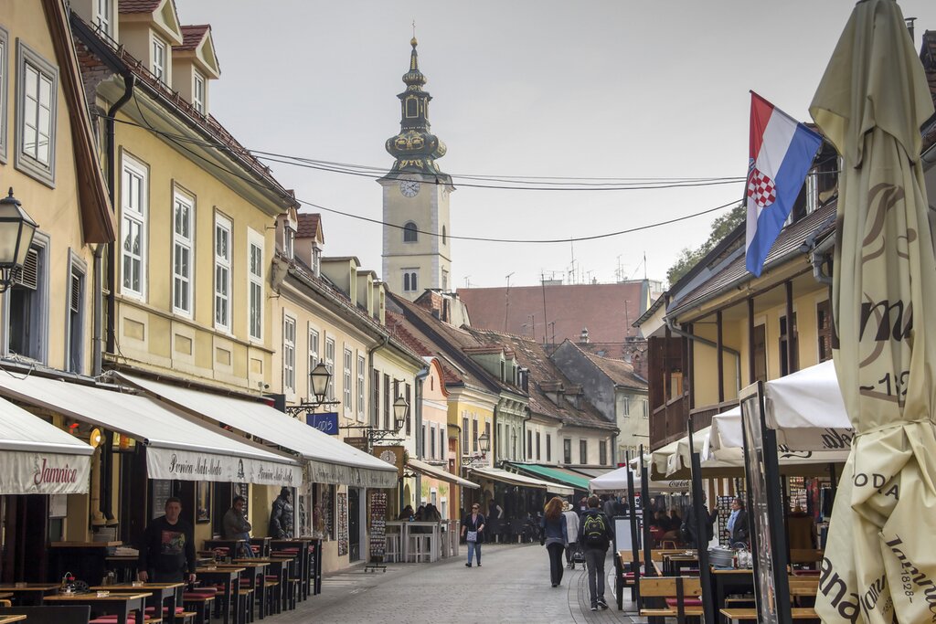 View at the Tkalčićeva Street with tourists and locals visiting pubs and cafe bars