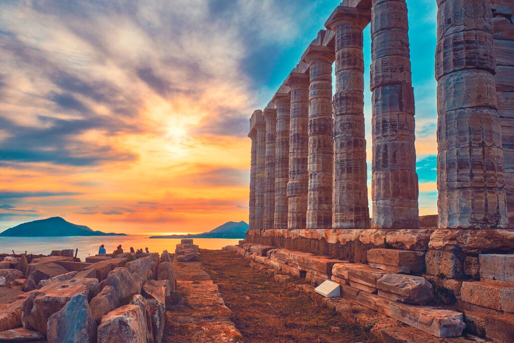Sunset over the Poseidon Temple ruins at Cape Sounio