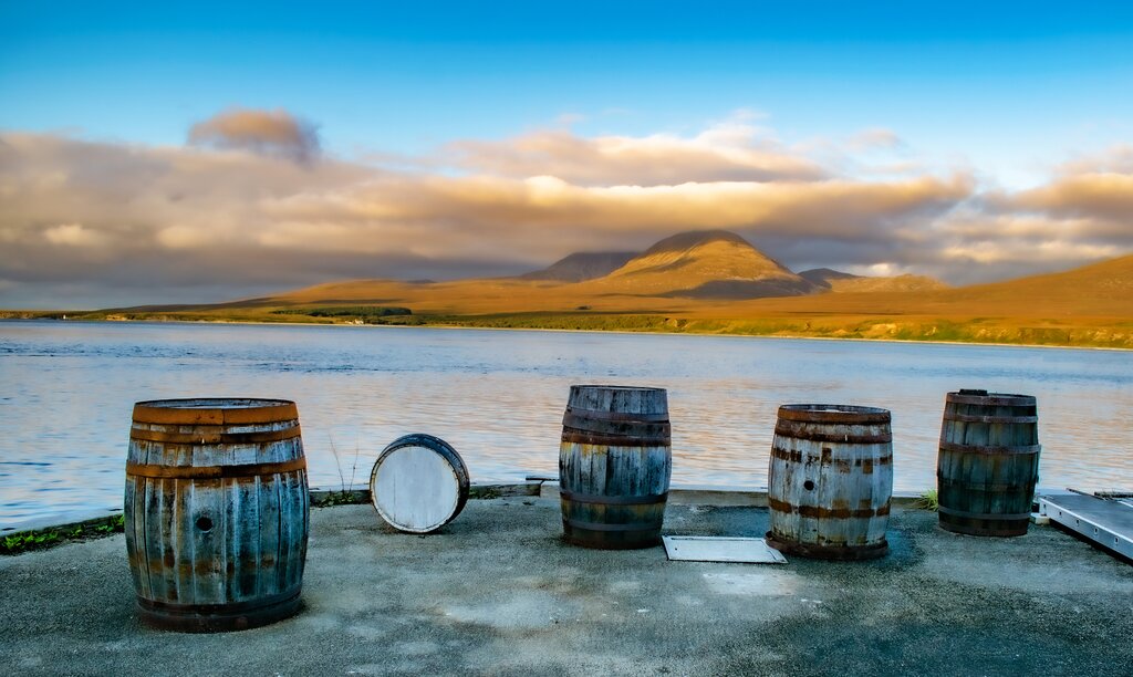 Whisky barrels in front of the sea on Islay