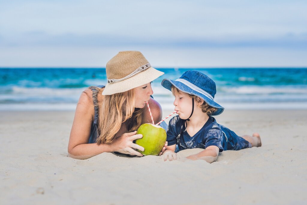 Sip the freshest coconut water at on the famous beach at Copacabana