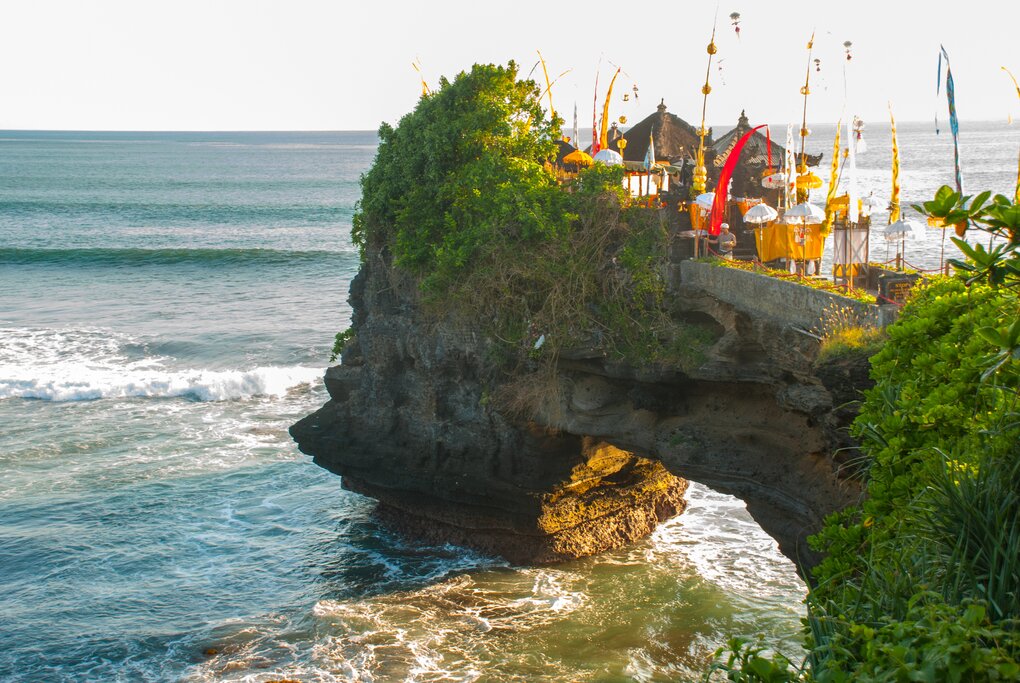 Start your journey across Bali at the iconic Tanah Lot Temple