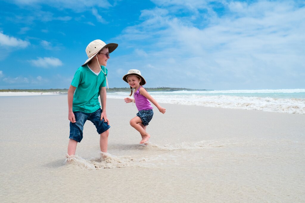 Beach day at San Cristobal Island with children