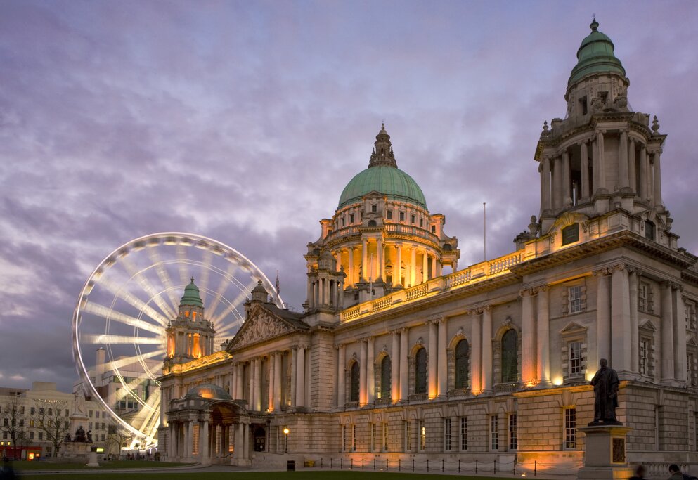 Belfast City Hall and ferris wheel at night
