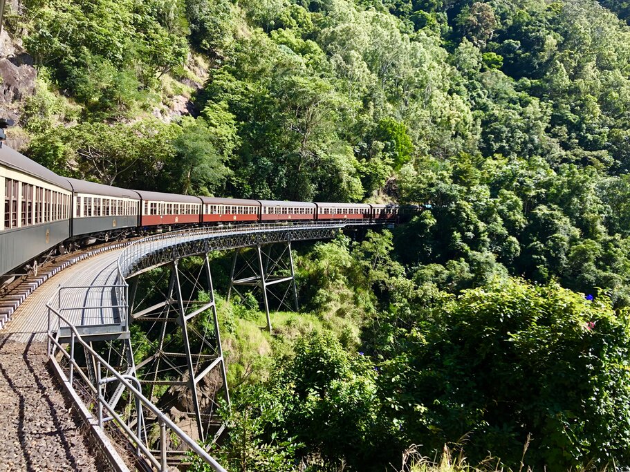 The Kuranda Railway train traveling along the largest bend in the track