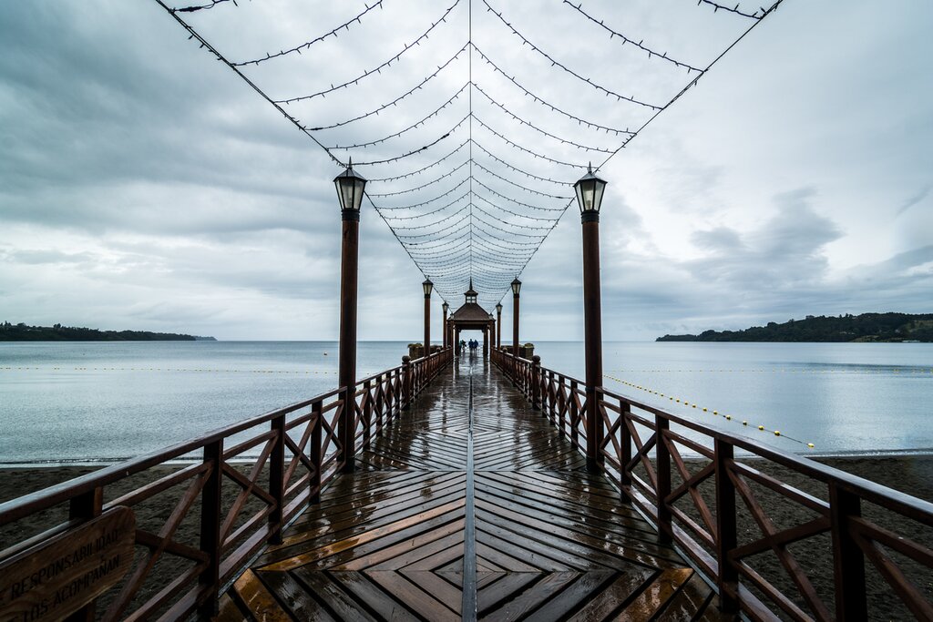Wooden pier in Frutillar with a view of the Lago Llanquihue in Chile's Lake District