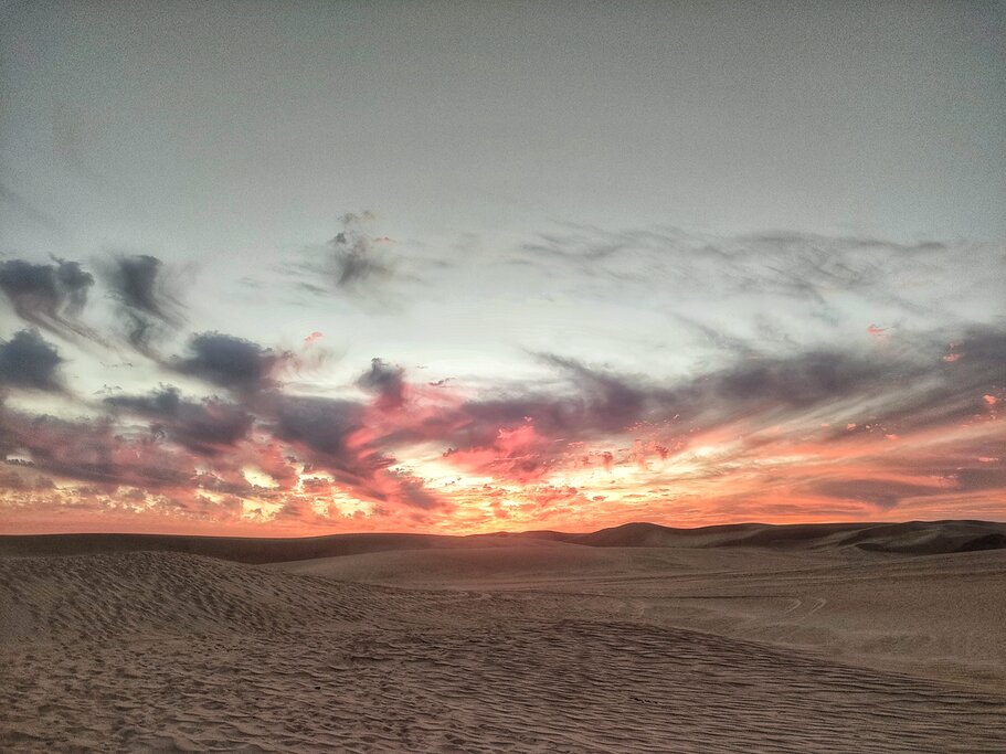 Watch the sunset from a Bedouin camp near Siwa