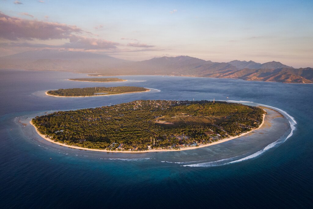 Watch the sunset over the Gili Islands