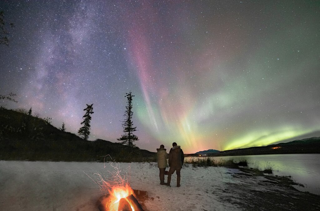 You'll have plenty of chances to glimpse the elusive northern lights on this winter adventure in Canada's remote northern provinces