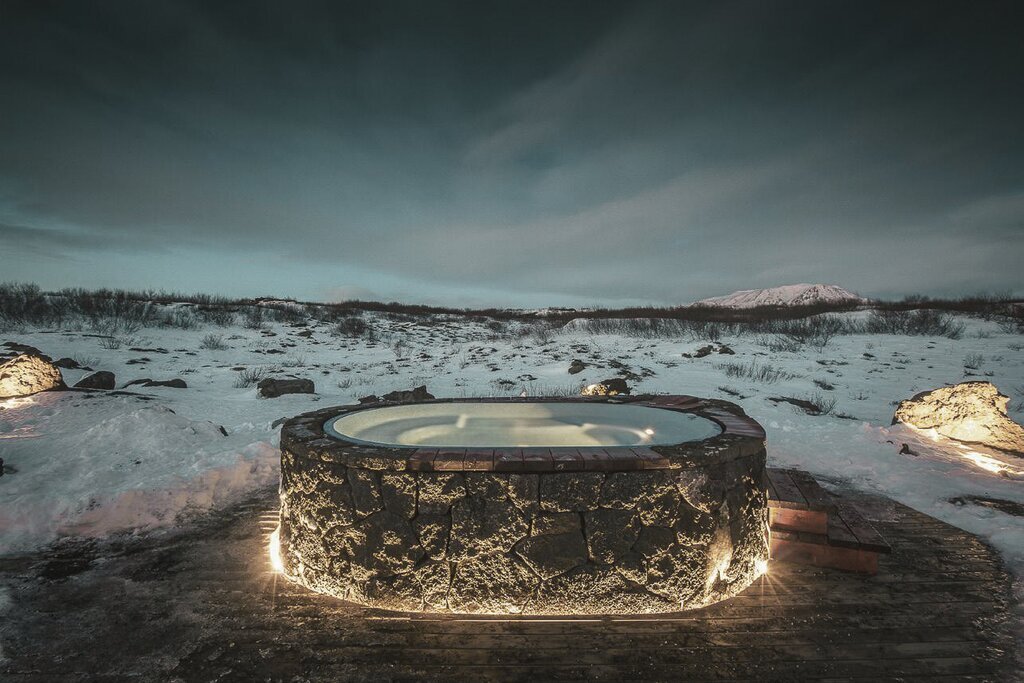 Relax in your volcanic hot tub in the remote wilderness (photo courtesy of Eldar Lodge)