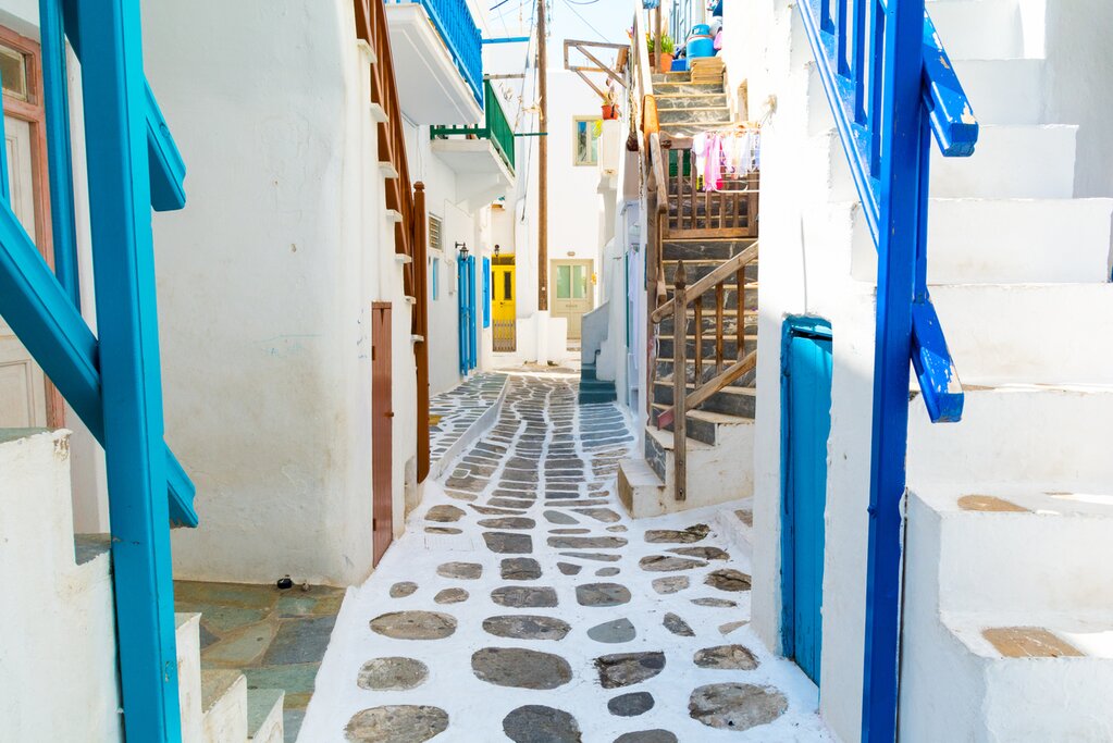 Mykonos traditional whitewashed narrow street