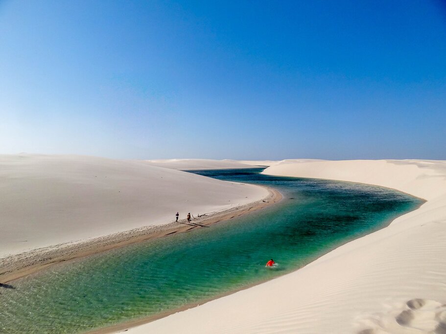 Stop for swim breaks in remote lagoons and lakes surrounded by sand dunes