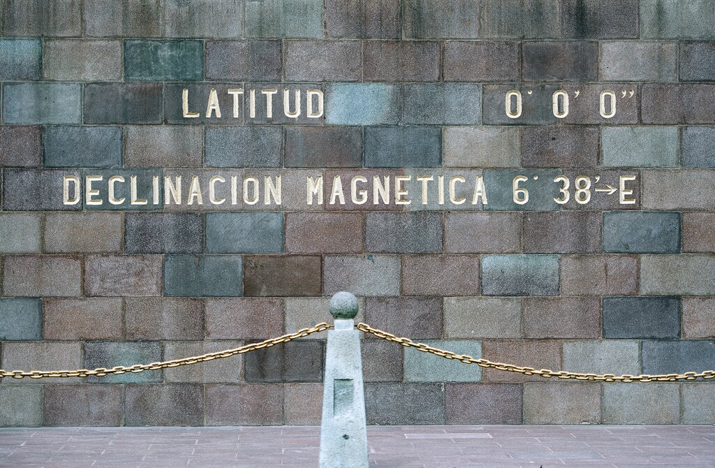 Engraving on the Middle of the World City monument showing that it's at latitude 0