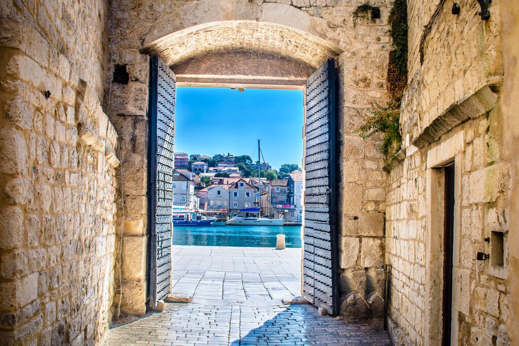 Just 30 minutes up the coast from Dubrovnik, Trogir is an island city rich in history