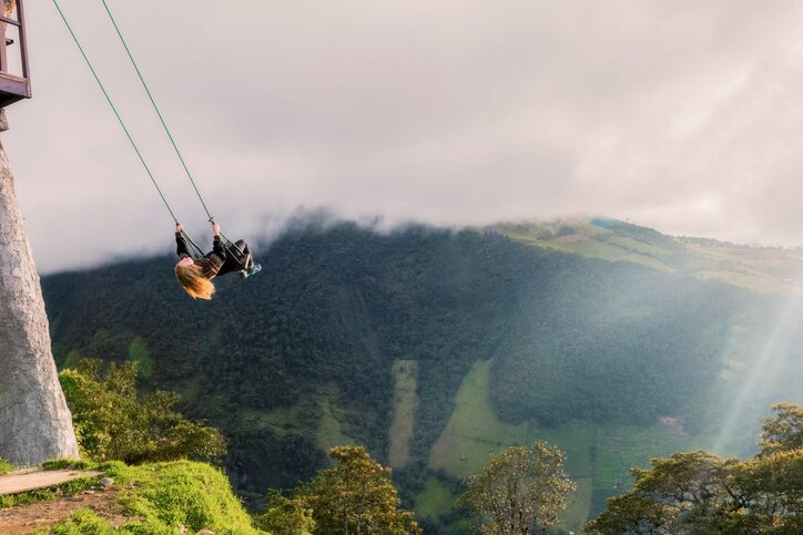 Soar over mountainsides in Ecuador's "Adventure Capital" of Baños