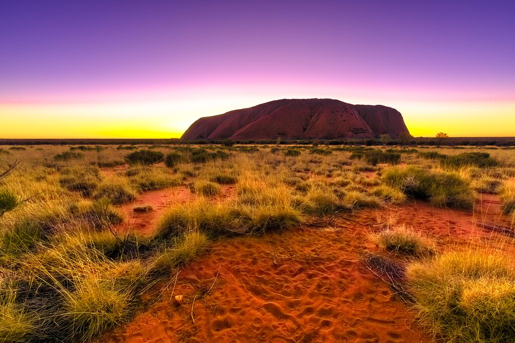 Watch the sun rise over Uluru
