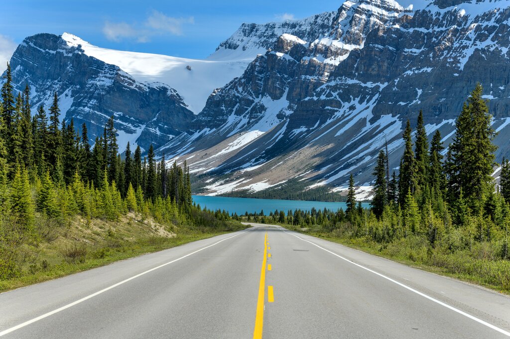 Drive along the iconic Icefields Parkway, surrounded by mountains and glacial lakes, to get to Jasper