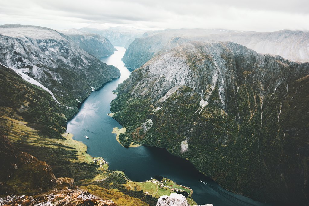 Sail through the breathtaking Nærøyfjord in winter.