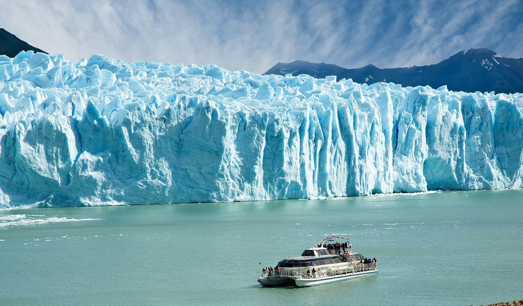 Boat Sailing Near Perito Moreno Glacier, In Patagonia.