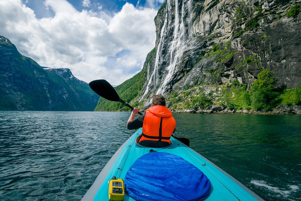 Kayaking offers spectacular views of the surrounding mountains.