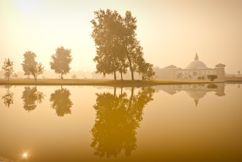 Reflections of the temple on the lake in Lumbini