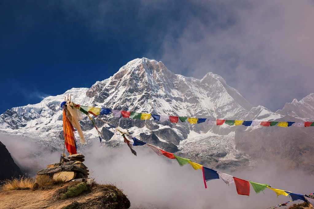 Annapurna I (8,091m) with prayer flag from Annapurna base camp ,Nepal.