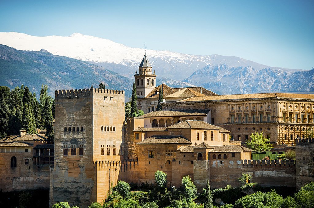 The snow-capped Sierra Nevada Mountains overlooking the Alhambra.