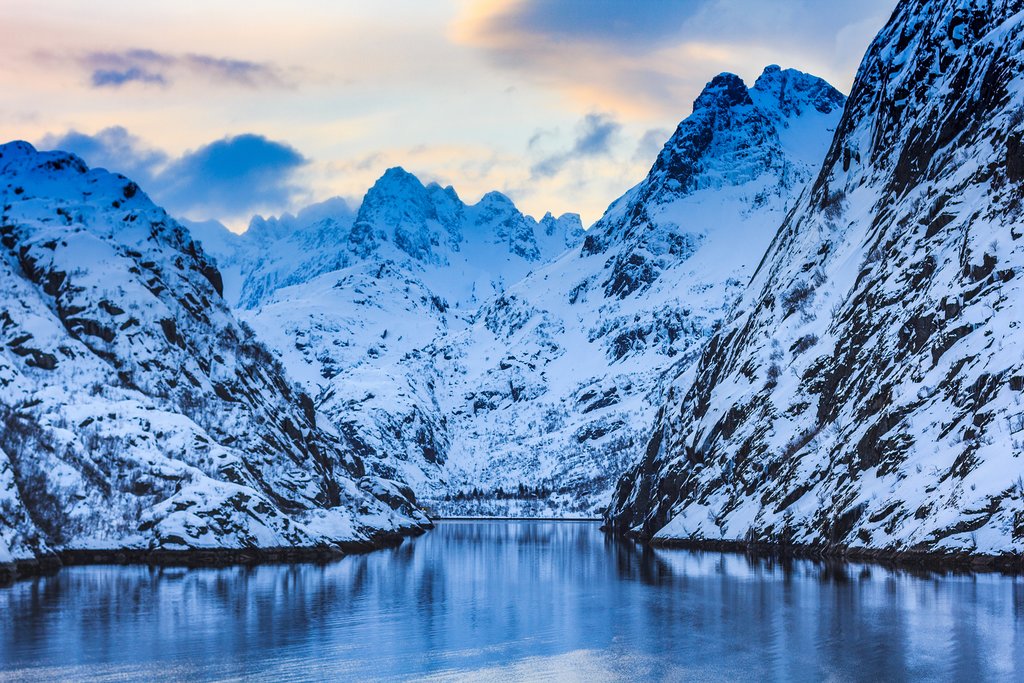 Take a boat ride through the narrow Trollfjord.