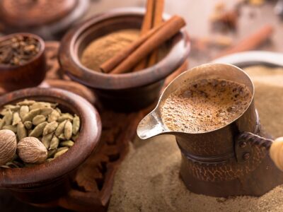 Coffee brewing in turkish pot and spices. Cezve