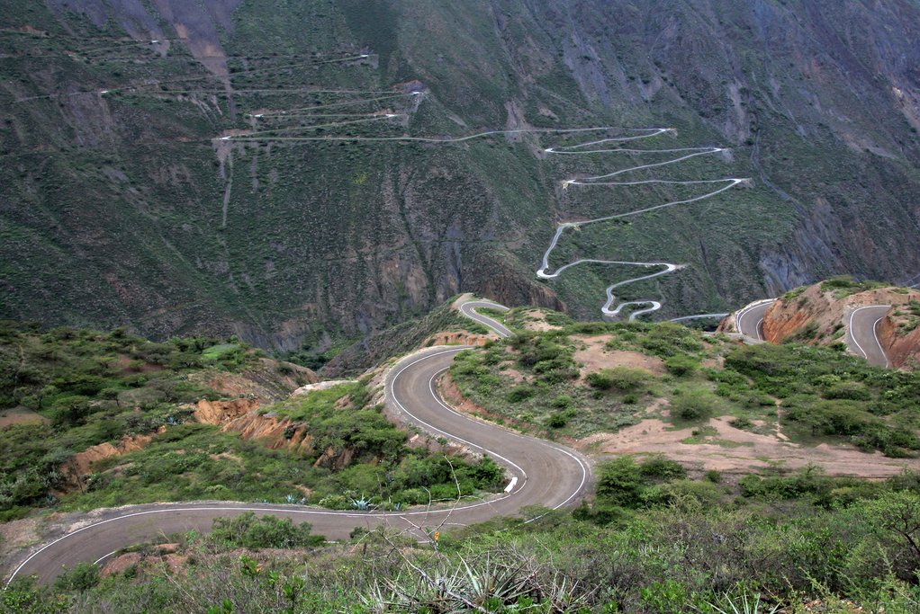 The mountain road weaves its way through steep terrain and provides many incredible views