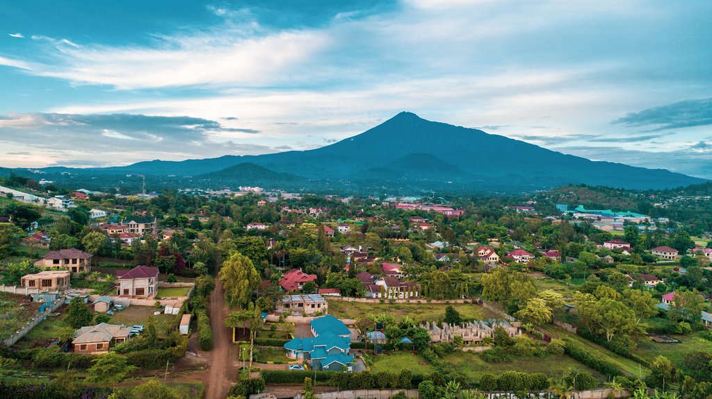 Arusha sits at the foot of Mount Meru