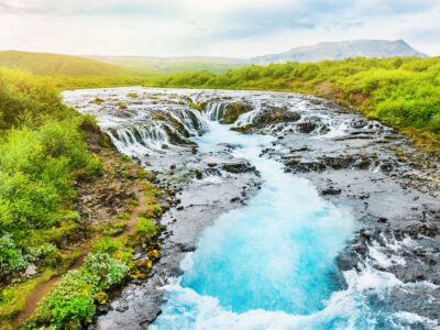 Bruarfoss Waterfall With Blue Water In Iceland. Beautiful Summer