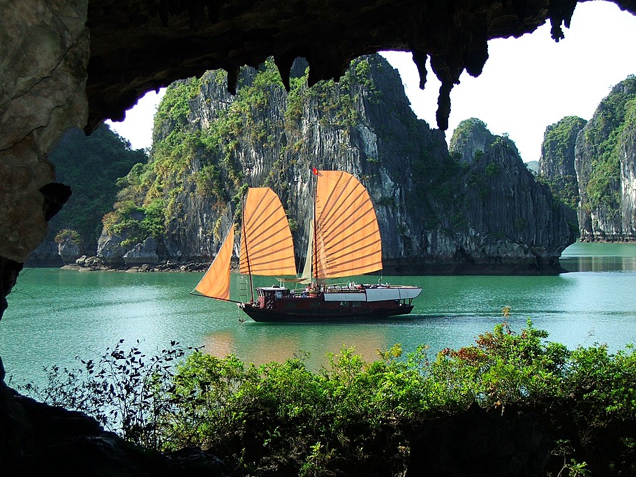 Cruising in a traditional junk boat is a quintessential Ha Long Bay experience