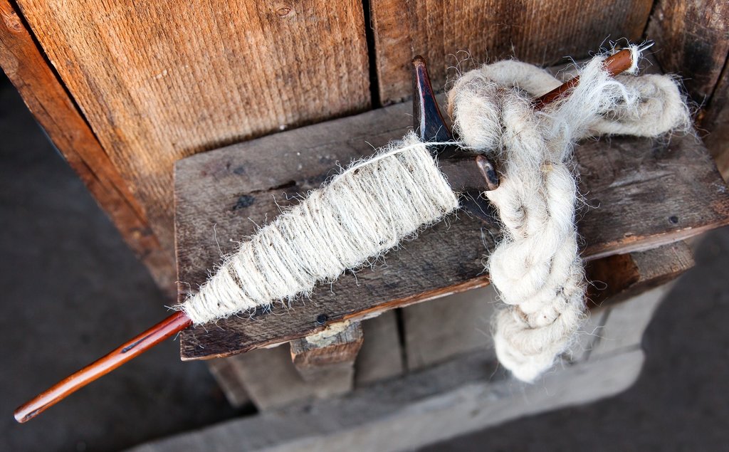 Watch local villagers spin yak wool