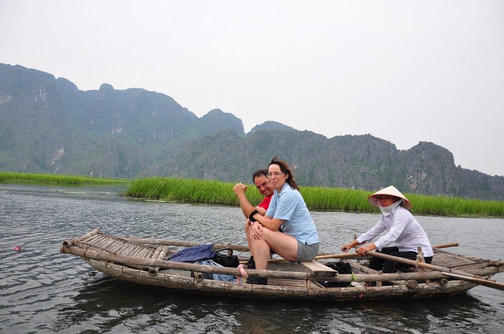 Riding a bamboo boat