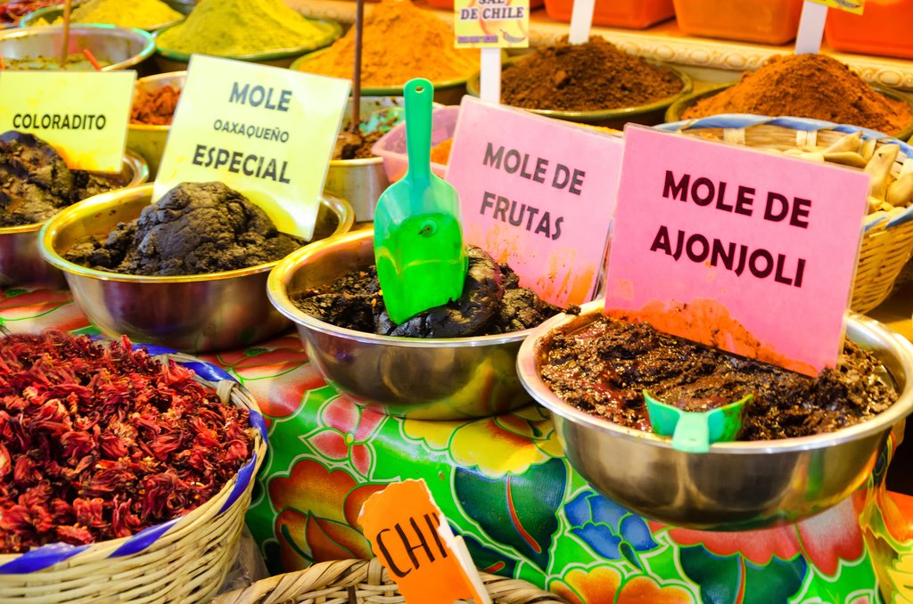Different types of mole and spices in the marketplace