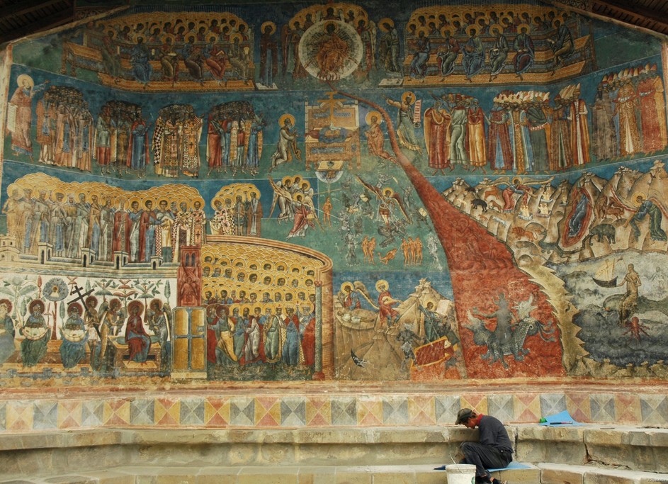 The brightly colored walls of a monastery in Bucovina.
