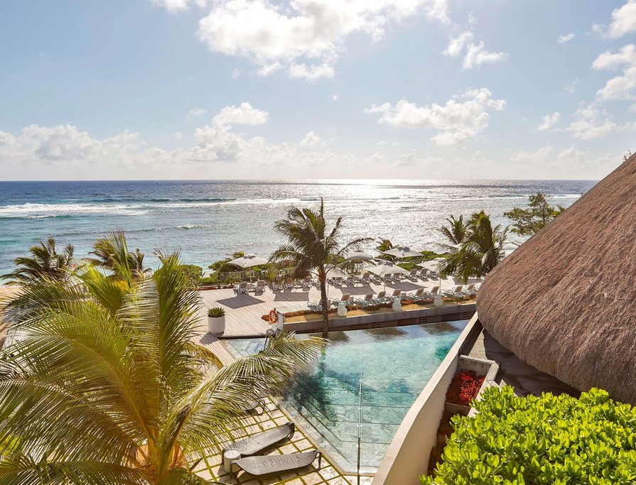 A view of the hotel pool and blue ocean