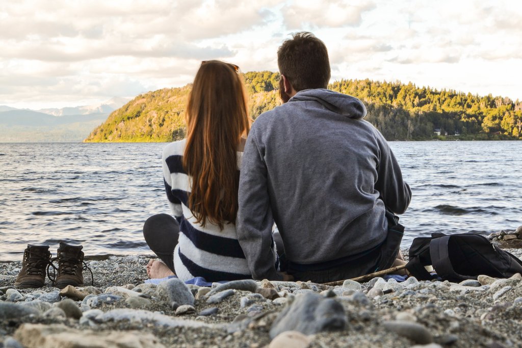 Relaxing by the shores of a lake in Bariloche.